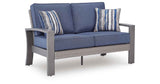 Half Moon Beach Blue/Gray Outdoor Loveseat with Cushion by Ashley at Eve Furniture