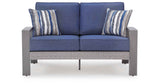 Half Moon Beach Blue/Gray Outdoor Loveseat with Cushion by Ashley at Eve Furniture