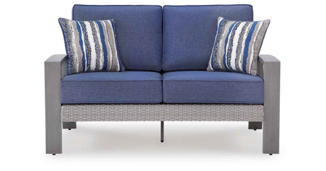 Half Moon Beach Blue/Gray Outdoor Loveseat with Cushion by Ashley at Eve Furniture