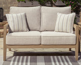 Hallow Creek Driftwood Outdoor Loveseat with Cushion by Ashley at Eve Furniture
