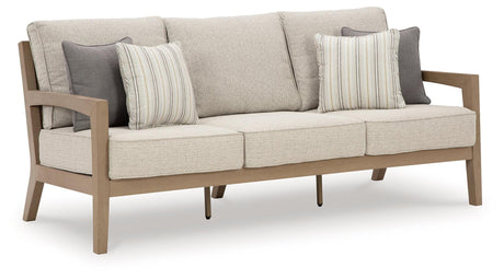 Hallow Creek Driftwood Outdoor Sofa with Cushion by Ashley at Eve Furniture