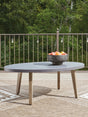 Harmony Headlands Natural/Gray Oval Cocktail Table by Ashley at Eve Furniture