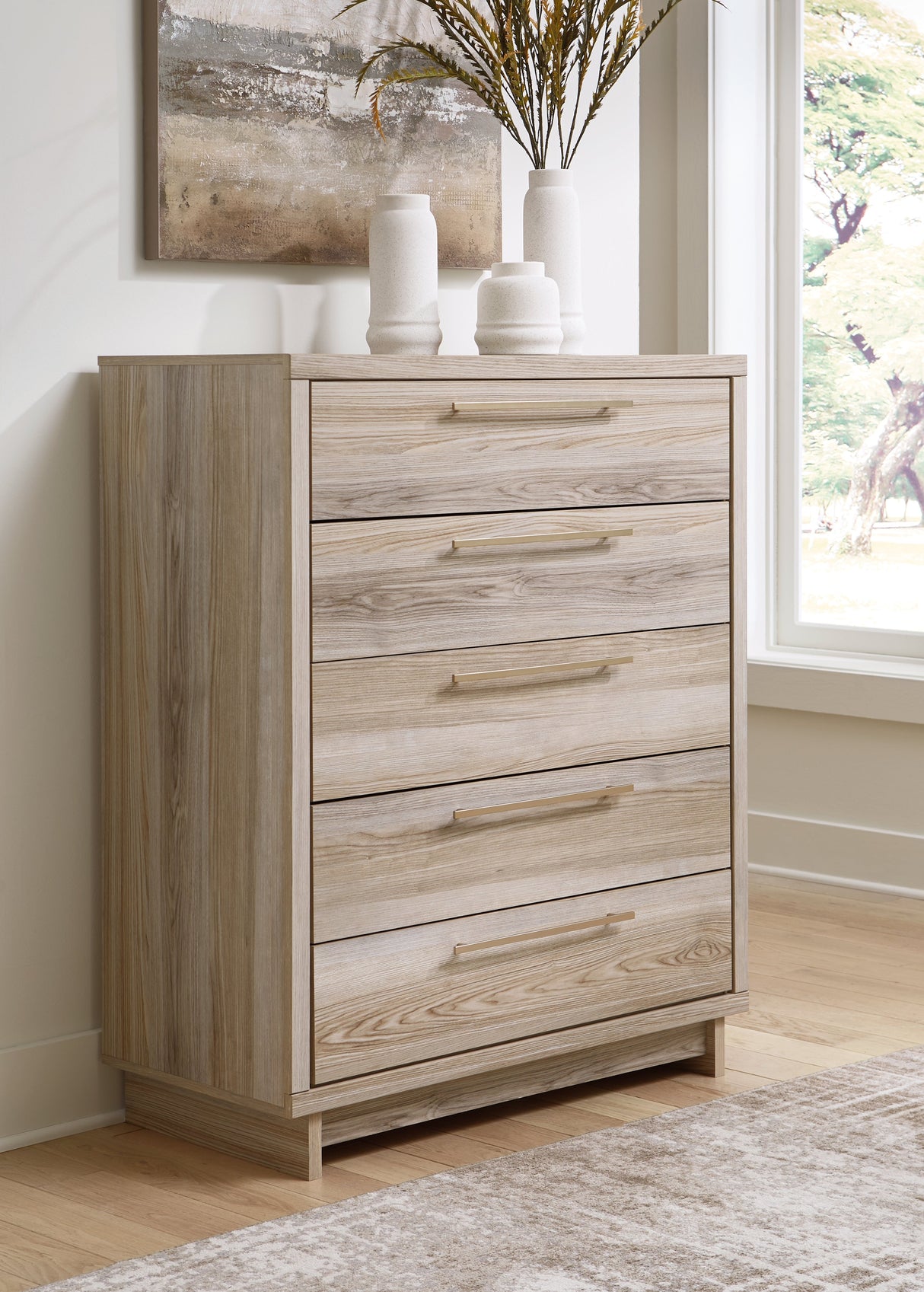 Hasbrick Tan Chest of Drawers