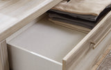 Hasbrick Tan Chest of Drawers