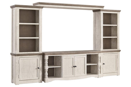 Havalance Two-tone 4-Piece Entertainment Center by Ashley at Eve Furniture