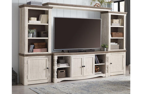 Havalance Two-tone 4-Piece Entertainment Center by Ashley at Eve Furniture