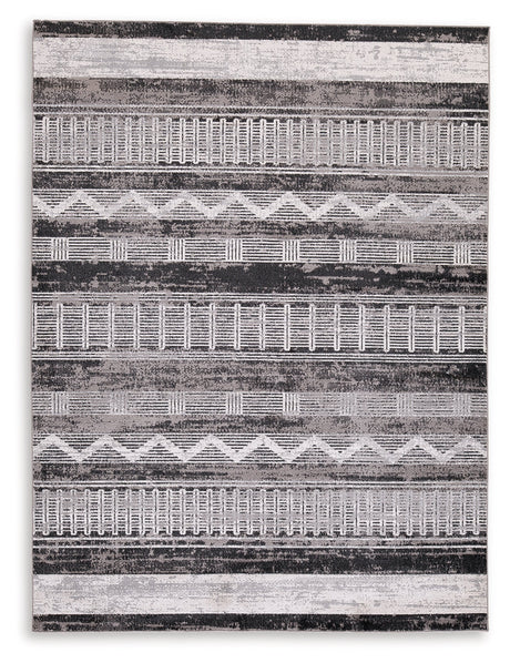 Henchester Multi 5' x 7' Rug by Ashley at Eve Furniture