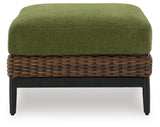 Horizon Hall Brown/Green Outdoor Ottoman with Cushion by Ashley at Eve Furniture