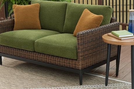 Horizon Hall Brown/Green Outdoor Loveseat with Cushion by Ashley at Eve Furniture