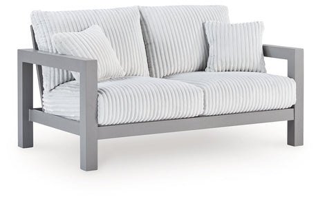 Hurley Park Gray Outdoor Loveseat with Cushion by Ashley at Eve Furniture