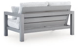 Hurley Park Gray Outdoor Loveseat with Cushion by Ashley at Eve Furniture