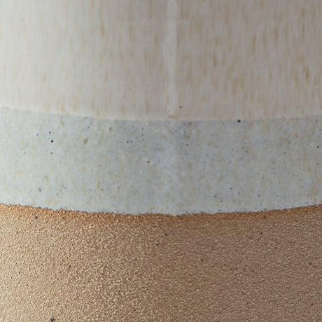 Hurston Ivory/Brown Candle Holder by Ashley at Eve Furniture