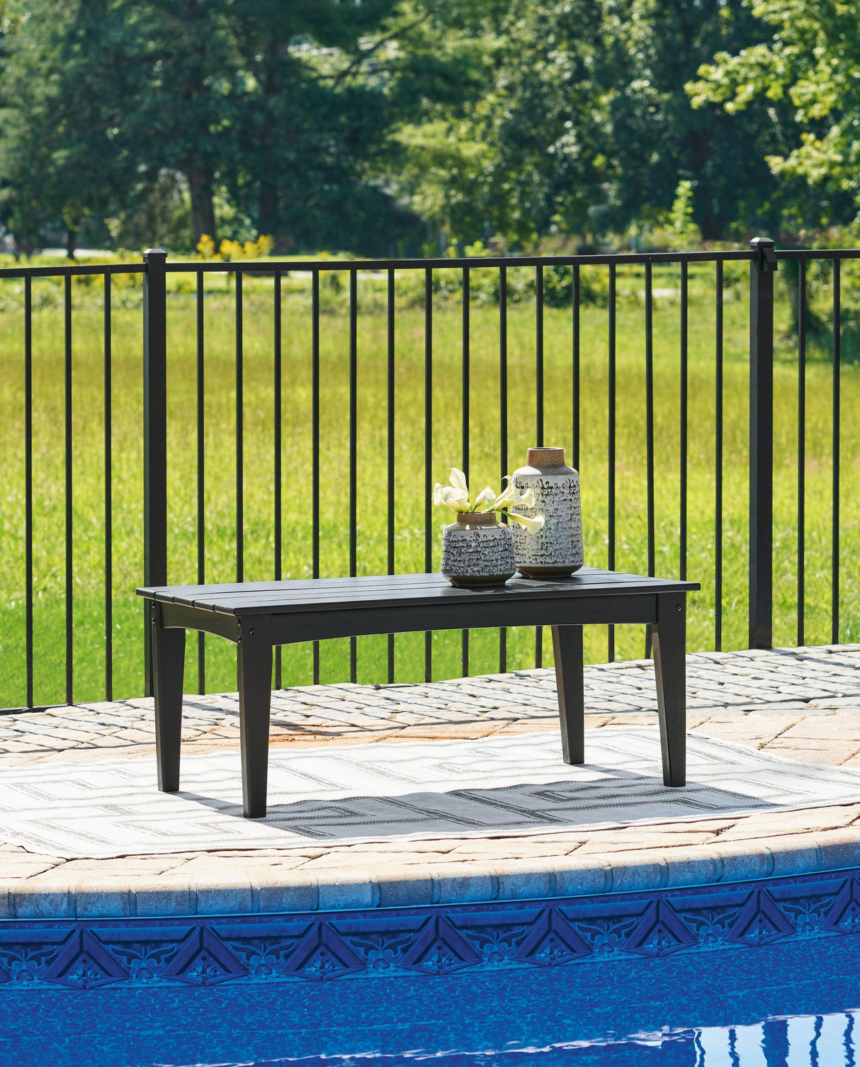 Hyland wave Black Outdoor Coffee Table by Ashley at Eve Furniture