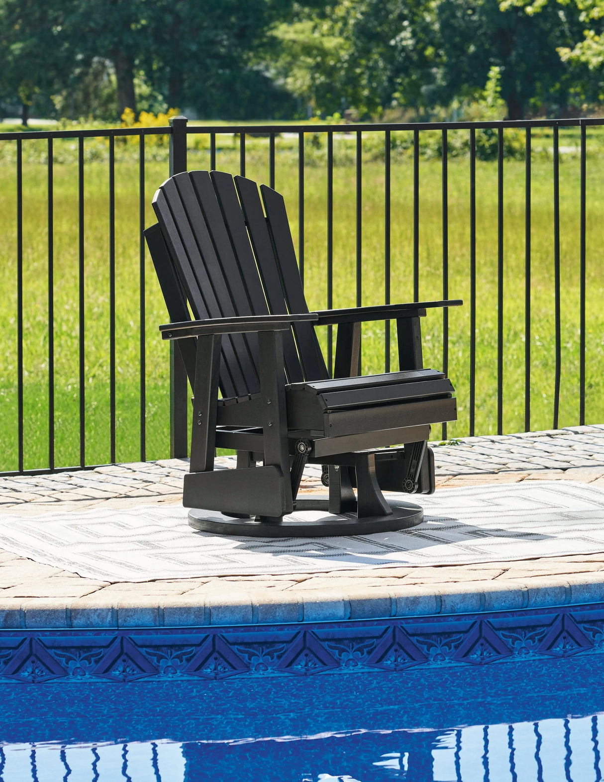 Hyland wave Black Outdoor Swivel Glider Chair by Ashley at Eve Furniture