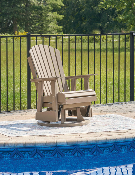 Hyland wave Driftwood Outdoor Swivel Glider Chair by Ashley at Eve Furniture