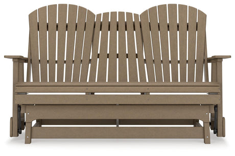 Hyland wave Driftwood Outdoor Glider Loveseat by Ashley at Eve Furniture