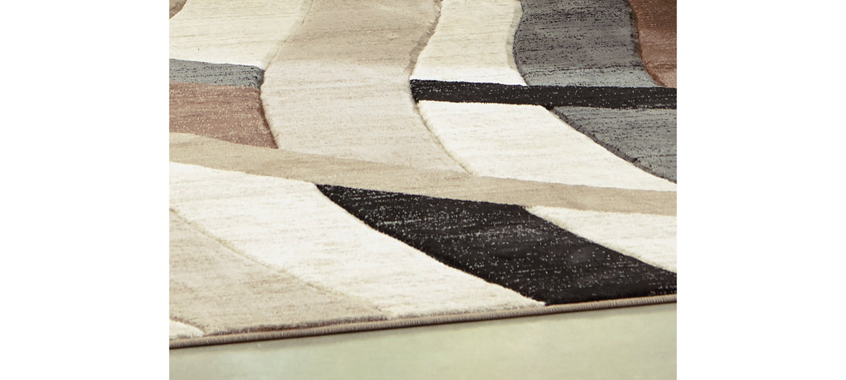Jacinth Multi 6'6" x 9'6" Rug by Ashley at Eve Furniture
