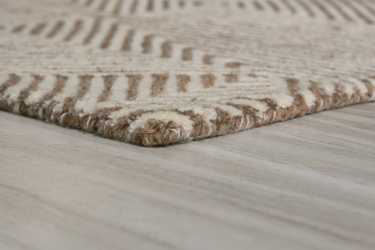 Jadott Beige/Brown Large Rug by Ashley at Eve Furniture