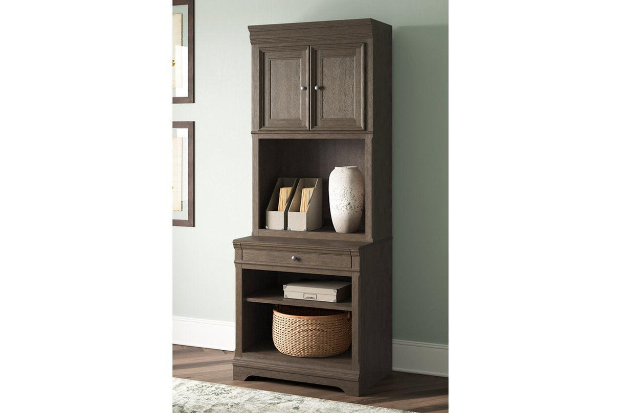 Janismore Weathered Gray Bookcase by Ashley at Eve Furniture