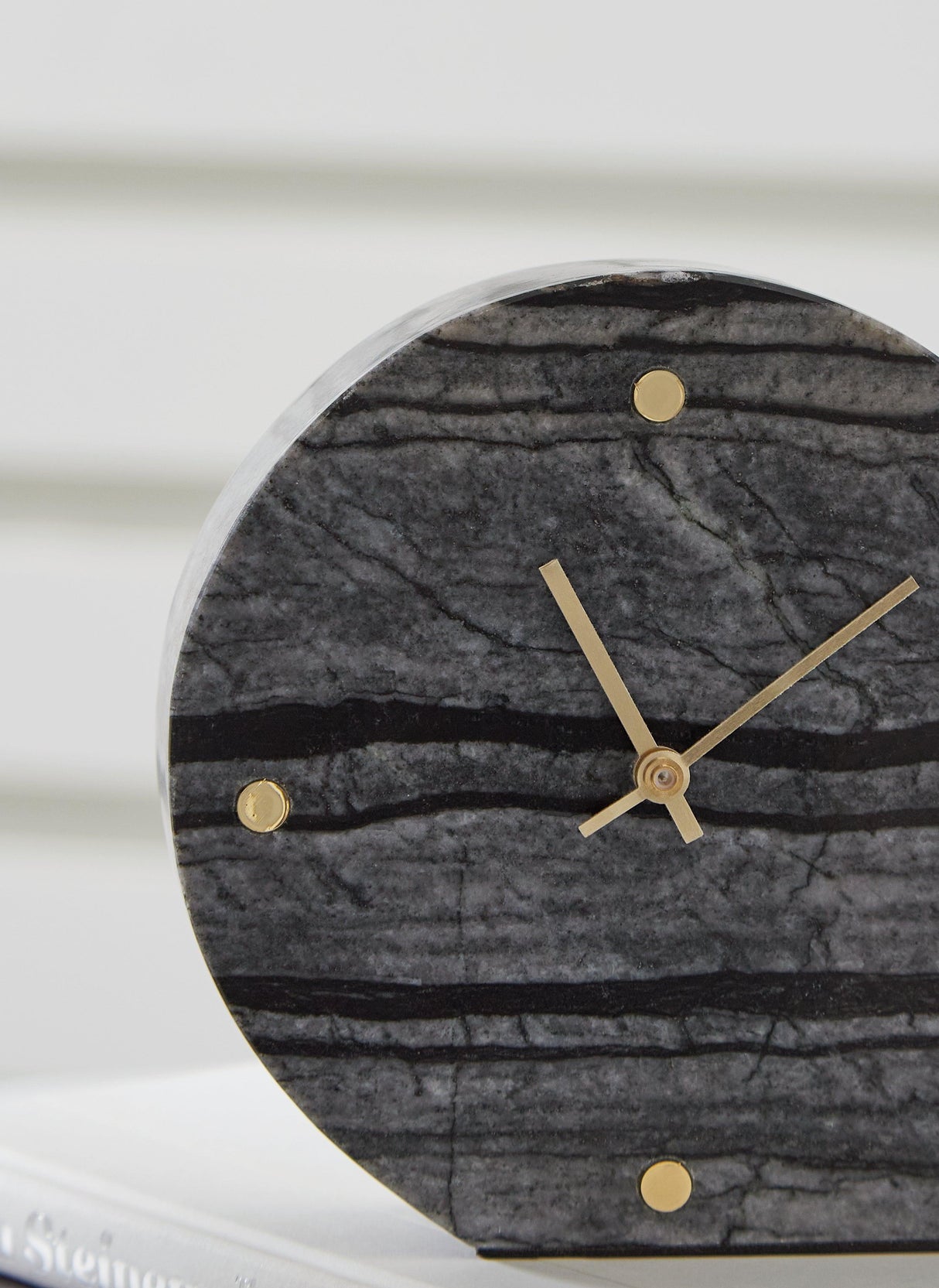 Janmour Black Table Clock by Ashley at Eve Furniture