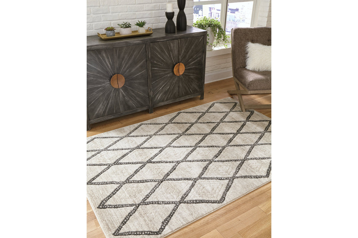 Jarmo Cream/Gray 5' x 7' Rug by Ashley at Eve Furniture