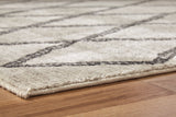 Jarmo Cream/Gray 5' x 7' Rug by Ashley at Eve Furniture