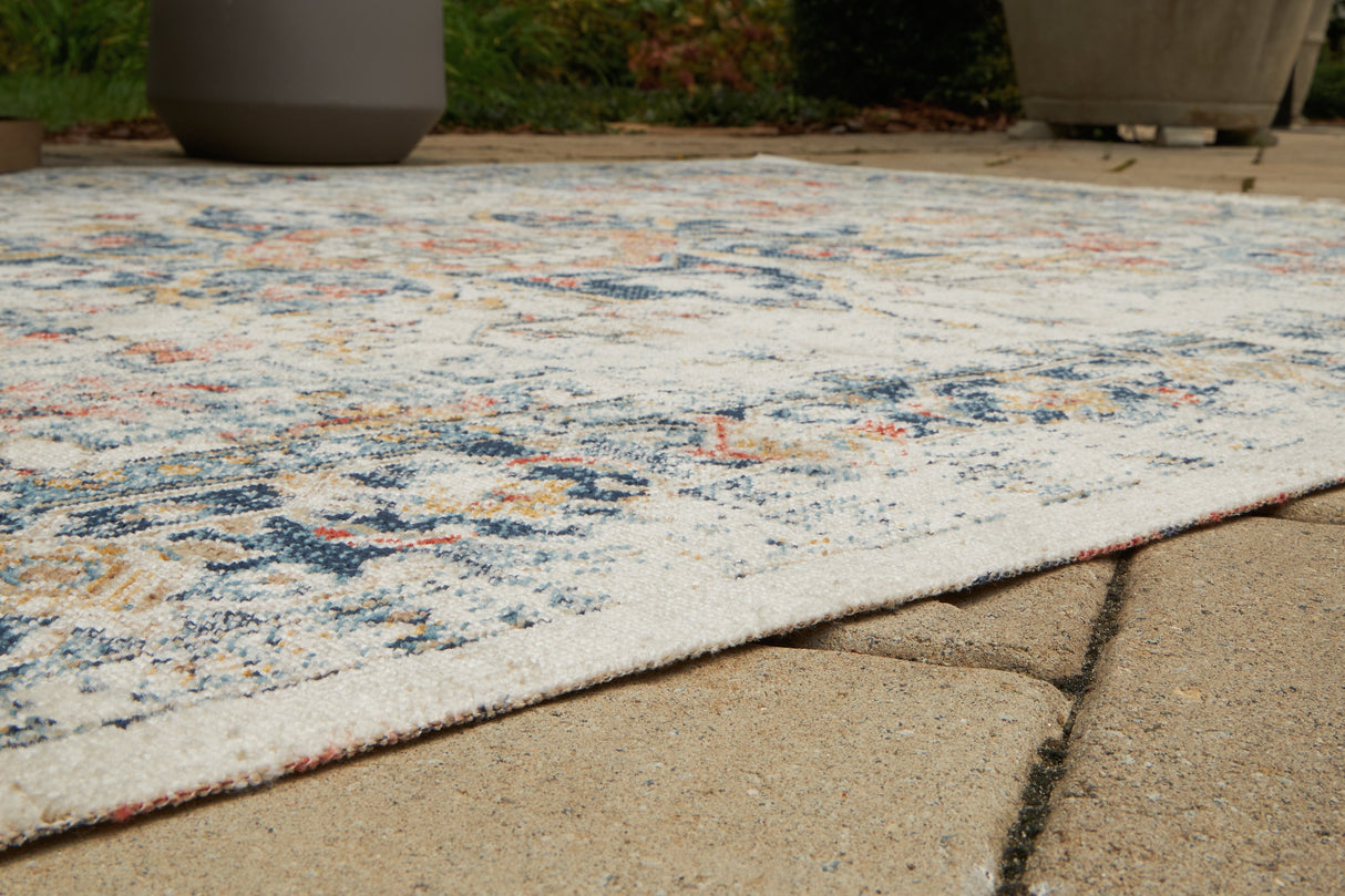 Jarrpage Multi 5' x 7' Rug by Ashley at Eve Furniture