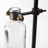 Jarvis Set of Five Dark Brown Metal and Glass Chemistry Inspired Bottles by Mercana at Eve Furniture