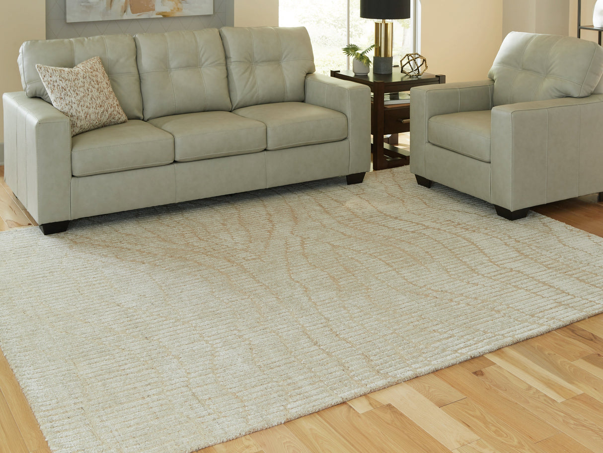 Jaseena Beige/Tan Large Rug by ASHLEY FURNITURE at Eve Furniture