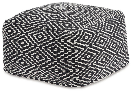 Jasett Black/Ivory Pouf by Ashley at Eve Furniture