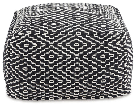 Jasett Black/Ivory Pouf by Ashley at Eve Furniture