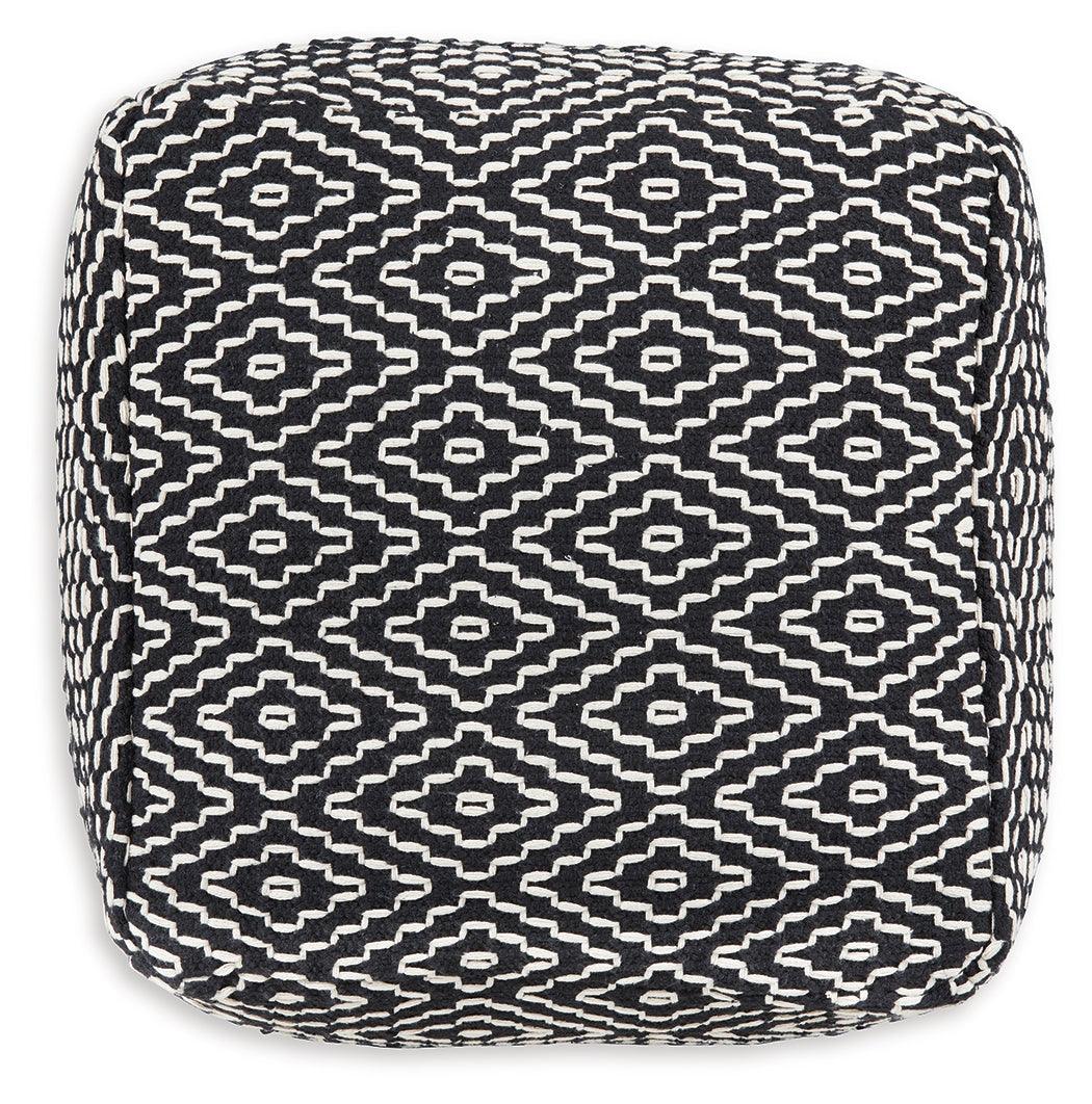 Jasett Black/Ivory Pouf by Ashley at Eve Furniture