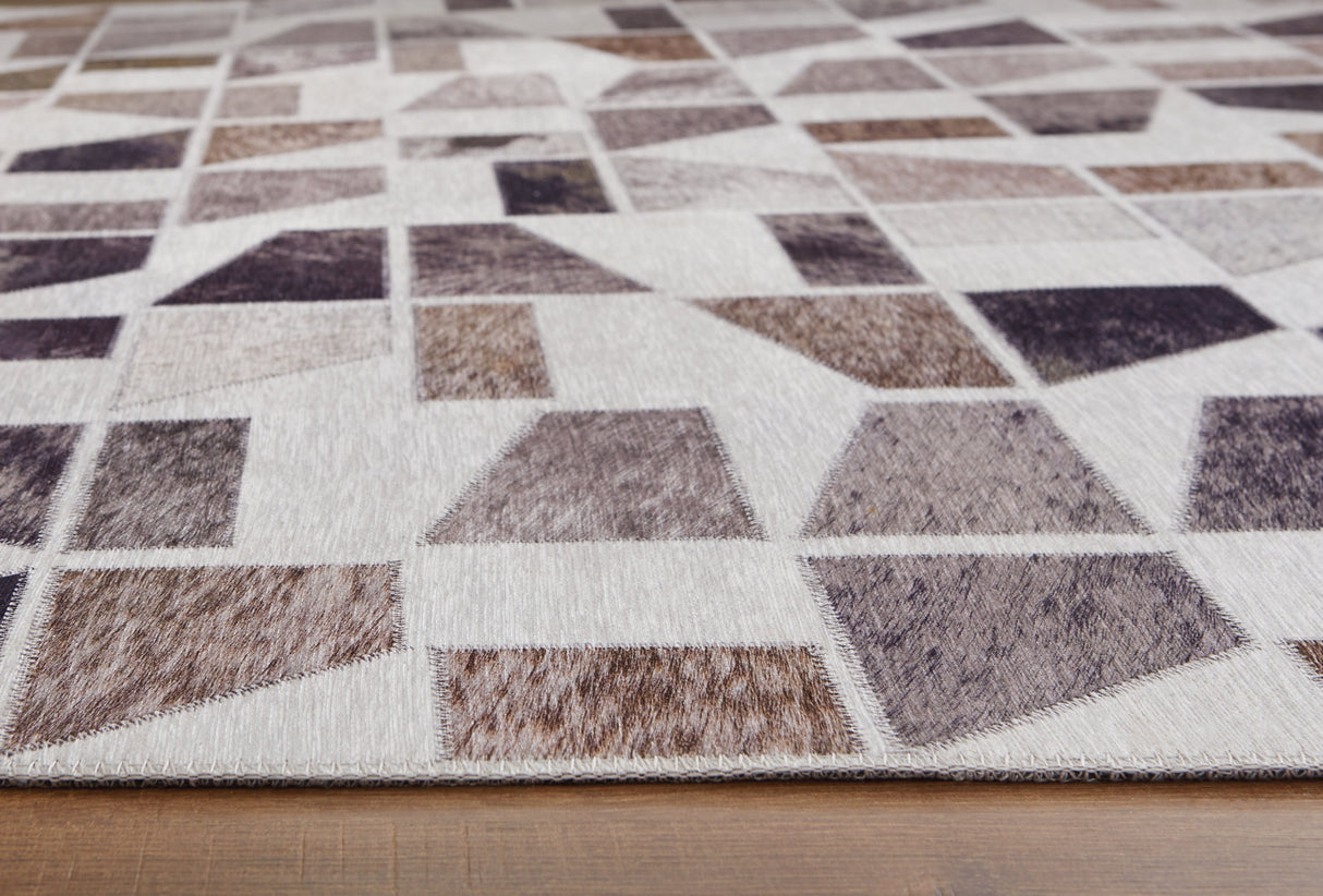 Jettner Multi 5' x 7' Rug by ASHLEY FURNITURE at Eve Furniture