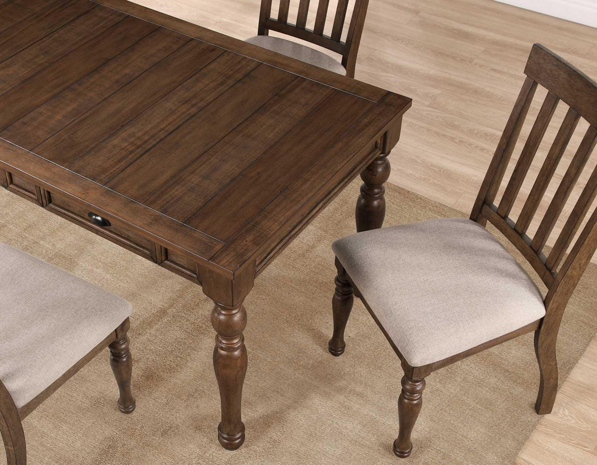 Joanna 59.5″ 4-Drawer Dining Table, Brown by Steve Silver at Eve Furniture