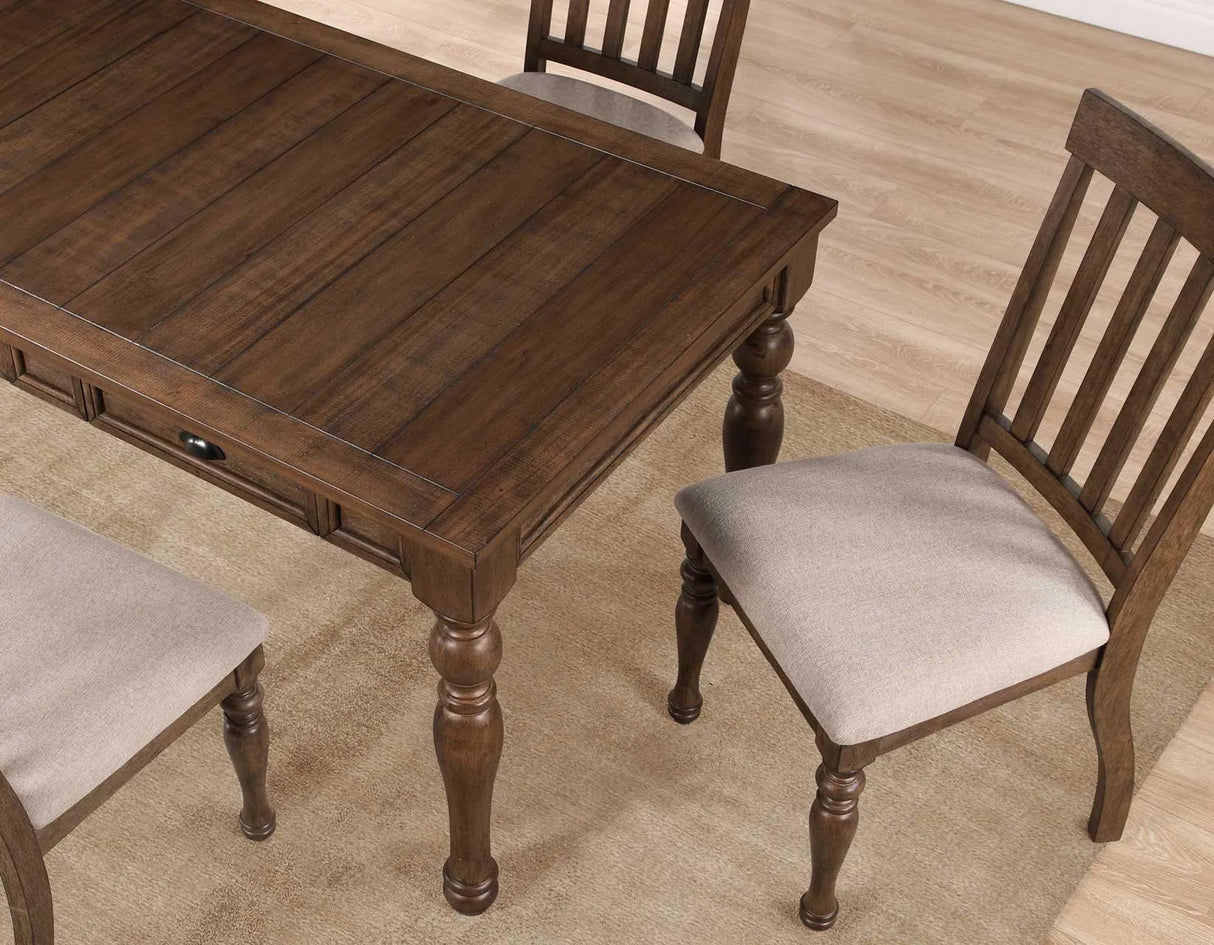 Joanna 59.5″ 4-Drawer Dining Table, Brown by Steve Silver at Eve Furniture