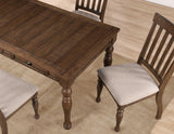 Joanna 59.5″ 4-Drawer Dining Table, Brown by Steve Silver at Eve Furniture
