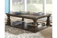 Johnelle Gray Coffee Table by Ashley at Eve Furniture