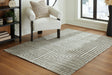 Jossen Ivory/Gray Medium Rug by Ashley at Eve Furniture