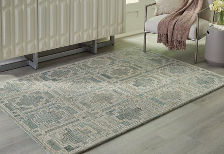 Jossland Turquoise/Ivory Medium Rug by Ashley at Eve Furniture