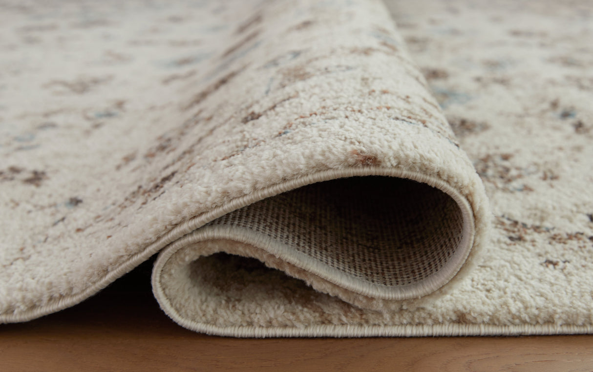 Jossler Ivory/Brown/Teal Medium Rug by Ashley at Eve Furniture