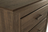 Juararo Dark Brown Chest of Drawers by Ashley at Eve Furniture