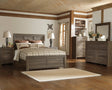 Juararo Dark Brown Panel Bedroom Set by Ashley at Eve Furniture