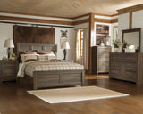 Juararo Dark Brown Panel Bedroom Set by Ashley at Eve Furniture