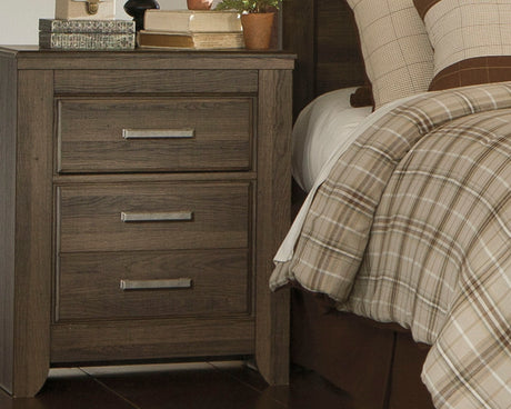 Juararo Dark Brown Poster Bedroom Set by Ashley at Eve Furniture