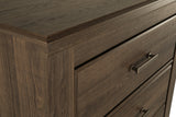 Juararo Dark Brown Poster Bedroom Set by Ashley at Eve Furniture