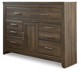 Juararo Dark Brown Poster Bedroom Set by Ashley at Eve Furniture