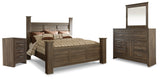 Juararo Dark Brown Poster Bedroom Set by Ashley at Eve Furniture