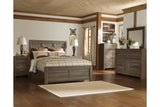 Juararo Dark Brown California King Panel Bed by Ashley at Eve Furniture