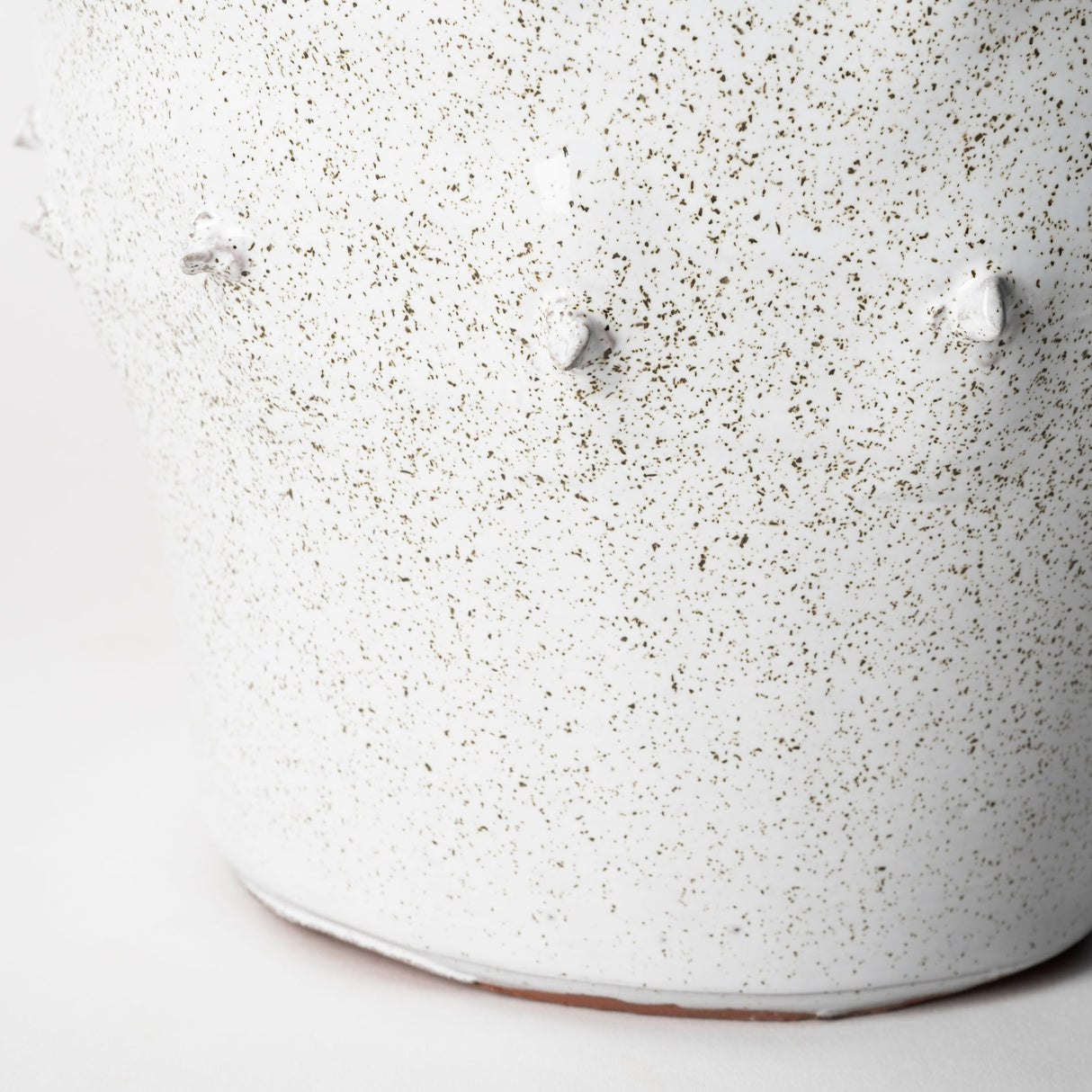 Julian Small Glossy White Ceramic Spoked Vase by Mercana at Eve Furniture