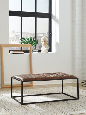 Junsor Brown/Black Coffee Table Ottoman by Ashley at Eve Furniture